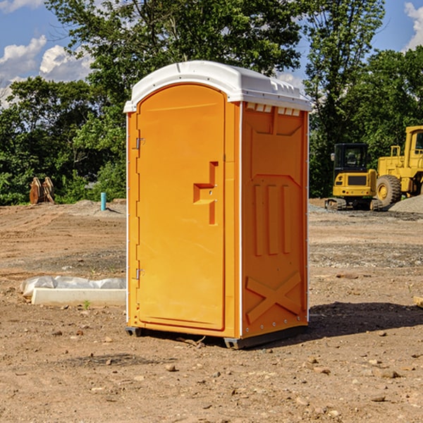 how often are the porta potties cleaned and serviced during a rental period in Seville